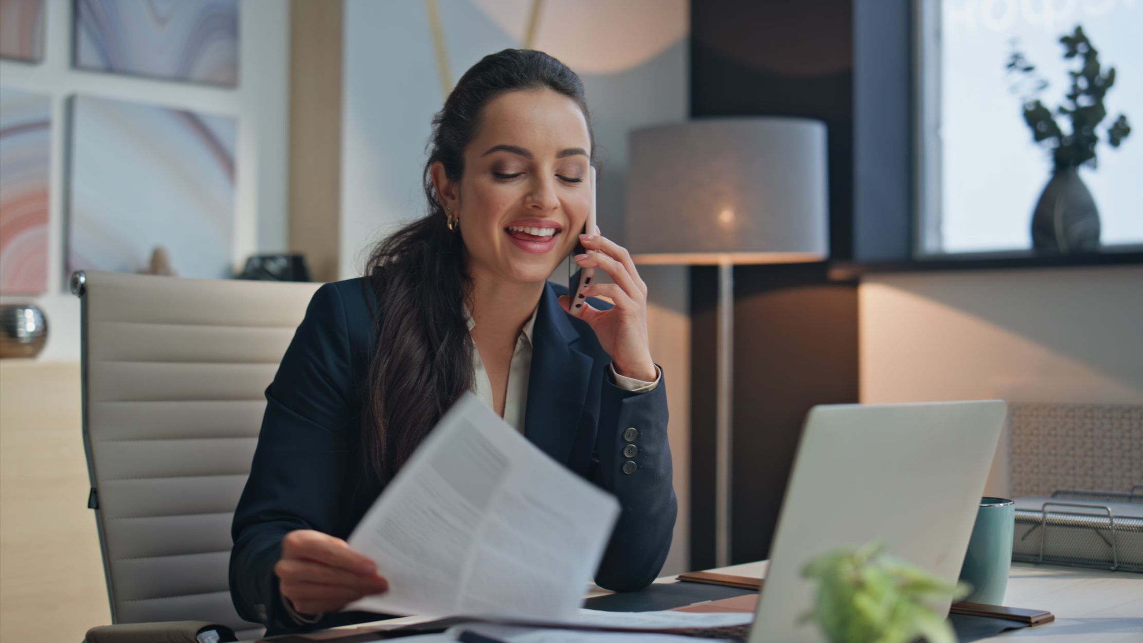 Happy Manager Calling Smartphone Looking Papers Office. Smiling Woman Speaking